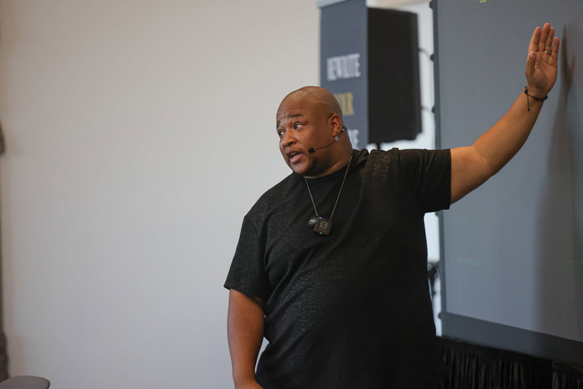 Frank Pace speaking live on stage